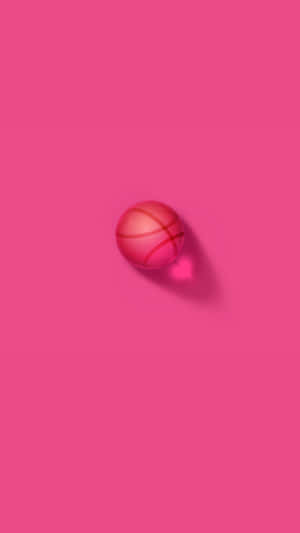 Playing The Game With A Vibrant Twist – Pink Basketball Wallpaper