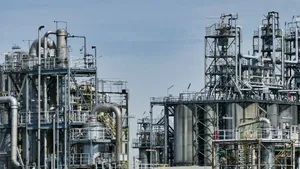 Port Harcourt Refinery Operator At Work Wallpaper