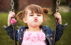 Pout Baby Girl Wallpaper