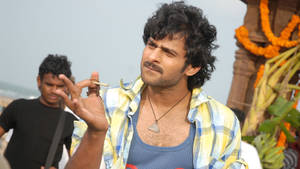 Prabhas Hd Flicking Away A Cigarette Wallpaper