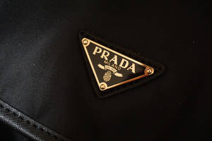 Prada Gold Badge Wallpaper