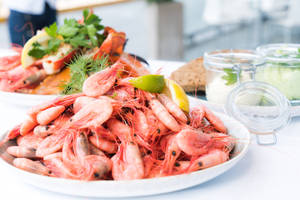 Prawns Piled On A White Plate Wallpaper