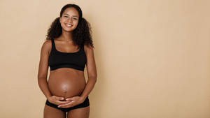 Pregnancy Beige Background Wallpaper