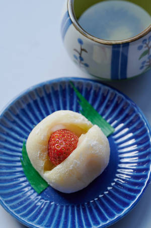 Premium Dessert Mochi With Green Tea Wallpaper