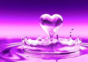 Pretty Purple Heart Shaped Drop Of Water Wallpaper