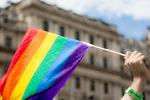 Pride_ Flag_ Waving_at_ Event.jpg Wallpaper