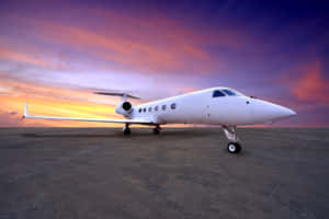 Private Jet Against Purple Sky Wallpaper