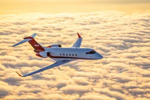 Private Jet Over Clouds Wallpaper