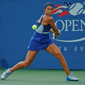 Pro Tennis Player Madison Keys In Action Wallpaper