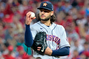 Professional Baseball Pitcher Lance Mccullers In Action Wallpaper