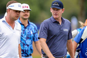 Professional Golfer Keith Mitchell With Fellow Golfers On The Course Wallpaper