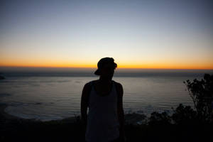 Profile Of A Man With A Calm Sea View Wallpaper