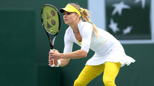 Progressive Tennis Athlete Maria Kirilenko In Action Wallpaper