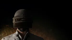 Pubg Hd Helmet Character And Orange Particles Wallpaper