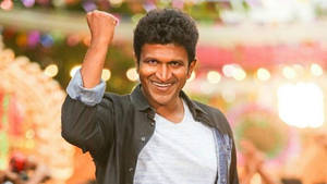 Puneeth Rajkumar Colorful Dancing Wallpaper