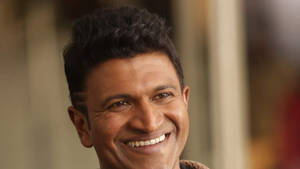 Puneeth Rajkumar Tears Of Joy Wallpaper