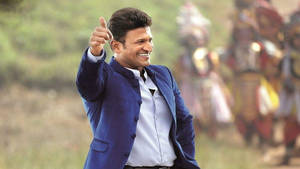 Puneeth Rajkumar Thumbs Up Wallpaper