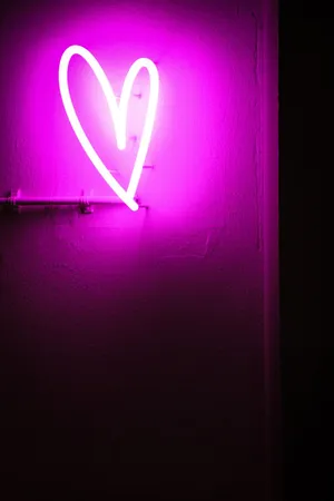 Purple Led Neon Heart Portrait Shot Wallpaper