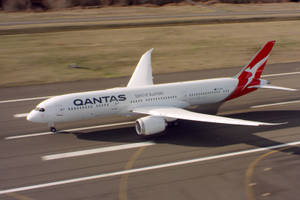 Qantas, The Spirit Of Australia Aircraft In Mid-flight Wallpaper