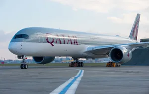 Qatar Airways Taxiing On The Runway Wallpaper