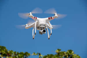 Quadcopter Drone In Flight Wallpaper