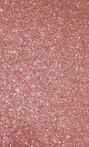 Radiant Rose Gold Glitters Sparkle Against A Barely Perceptible Grey Background Wallpaper