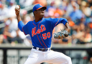 Rafael Montero Wearing Blue Mets Uniform Wallpaper