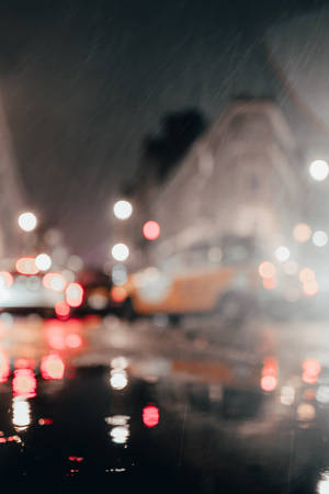 Rain On A Busy Road Bokeh Wallpaper