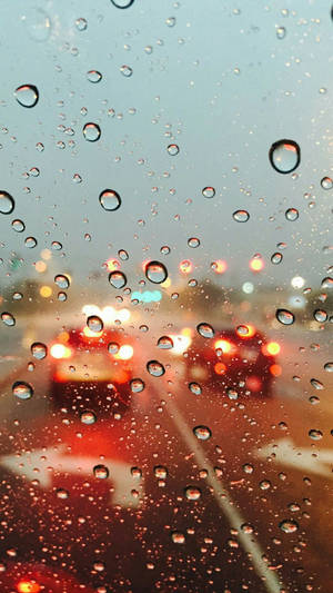 Raindrops On Car Glass Window Close Up Wallpaper