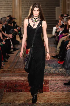 Ralph Lauren Corporation Serious With Bag Wallpaper