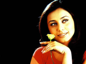 Rani Mukerji With Yellow Flower Wallpaper