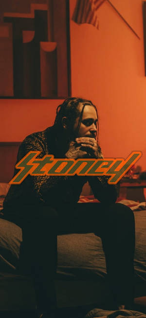 Rap Artist Contemplative Pose Stoney Wallpaper