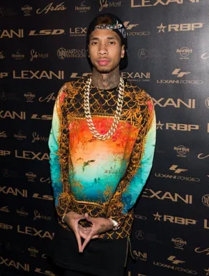 Rapper Tyga Celebrating Success Wallpaper