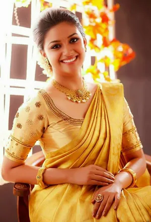 Ravishing Keerthi Suresh In Yellow Sari Wallpaper