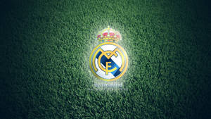 Real Madrid Cf Grassy Logo Wallpaper