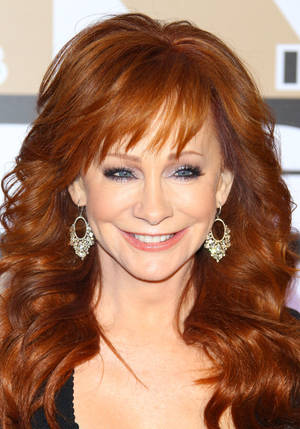 Reba Mcentire Country Singer Camera Flash Wallpaper