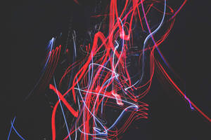 Red And Black Iphone Showing Stunning Dual-tone Finish Wallpaper