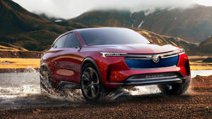 Red Buick Enclave Running Through Water Wallpaper