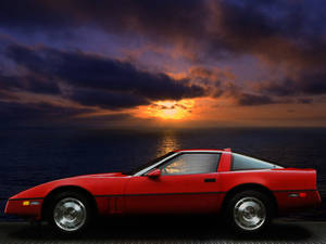 Red C4 Corvette At Dusk Wallpaper