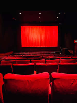 Red Cinema Hall Empty Seats Wallpaper