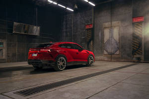 Red Lambo Truck In Garage Wallpaper