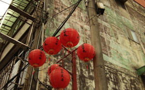 Red Lanterns Near Chinese House Wallpaper