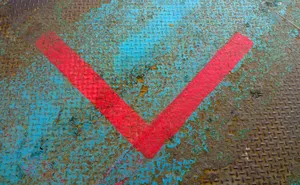 Red Letter V On Rusty Floor Wallpaper