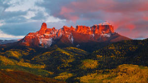 Red Mountain And Cloudy Sky Wallpaper