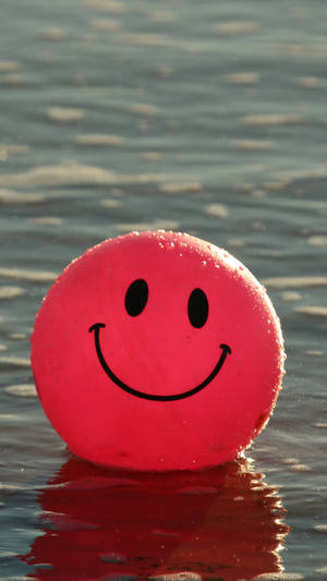 Red Smiley Emoji Balloon Wallpaper