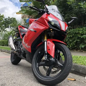 Red Sport Motorcycle Parked Outdoors Wallpaper