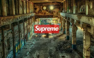 Red Supreme Logo On Abandoned Building Wallpaper