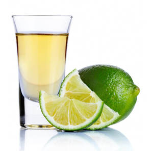 Refreshing Tequila Shots Complemented By Fresh Lime Slices Wallpaper