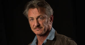 Renowned American Actor, Sean Penn In A Contemplative Pose. Wallpaper