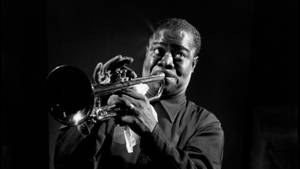 Renowned Jazz Musician Louis Armstrong Wallpaper